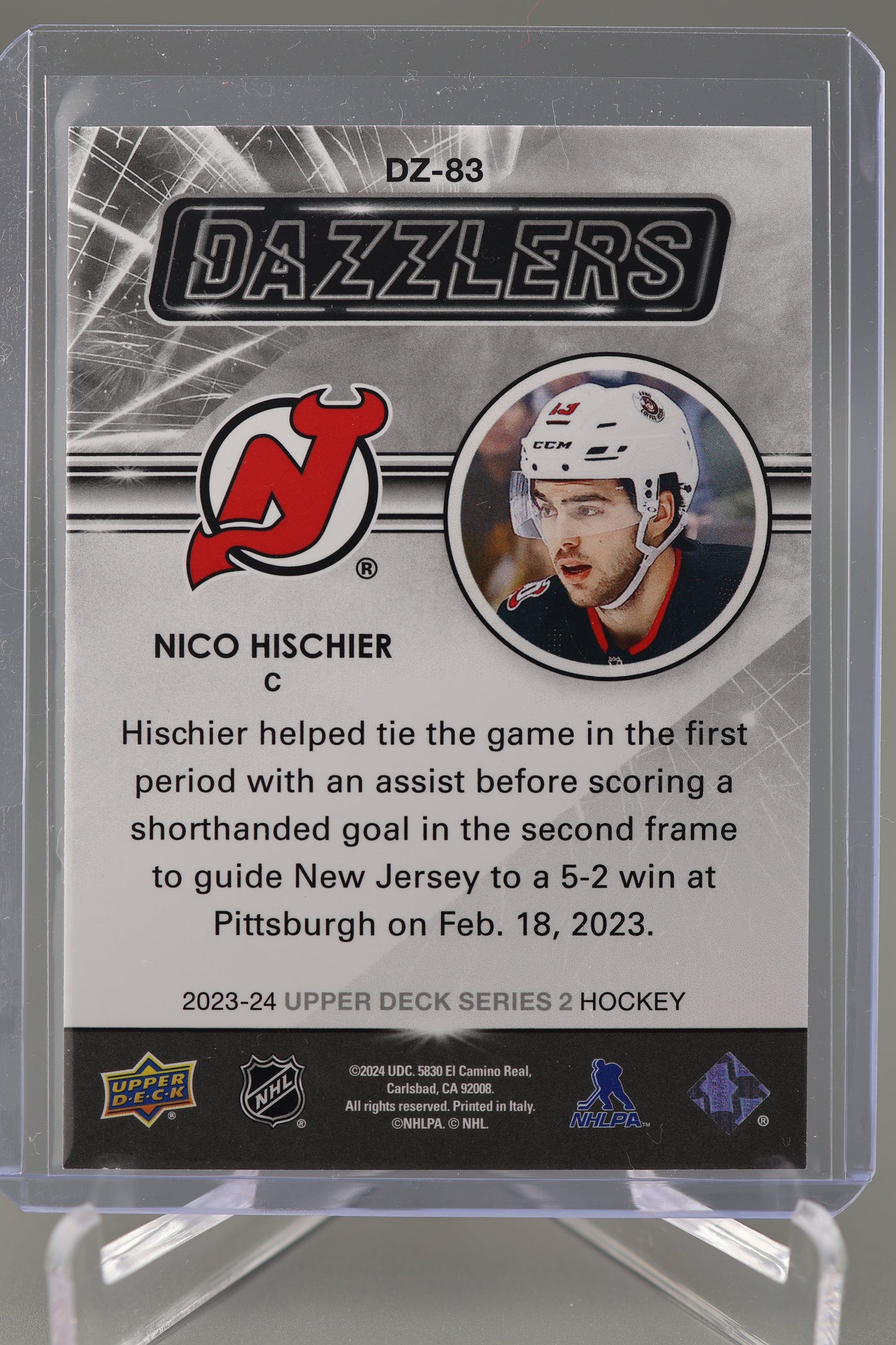 Nico Hischier 2023-24 Upper Deck Series 2 Hockey #DZ-83 Orange Dazzlers Devils
